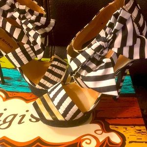 Black and white platform heels bow on the side crisscross in the front